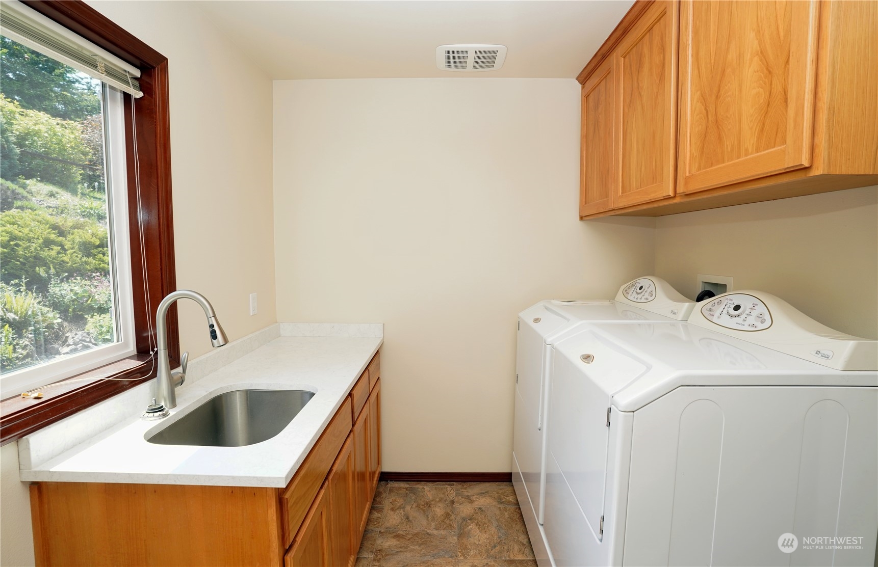 522 Fox Hollow Road Sequim, WA 98382 - Photo 33 of 40 a view of utility room with sink washer and dryer