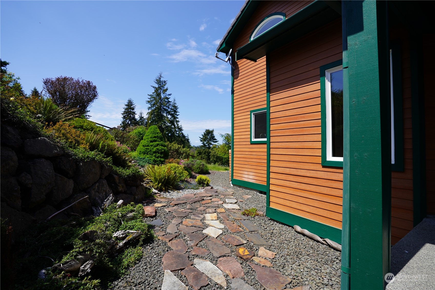 522 Fox Hollow Road Sequim, WA 98382 - Photo 38 of 40 a backyard of a house with lots of green space