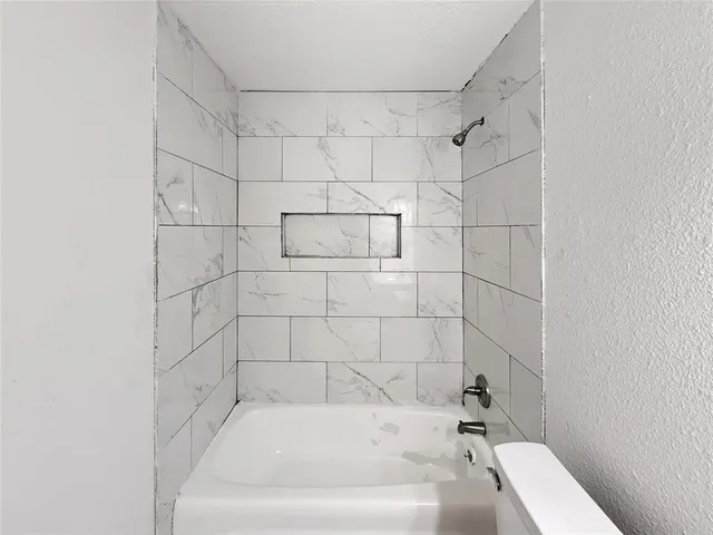 a bathroom with a bathtub