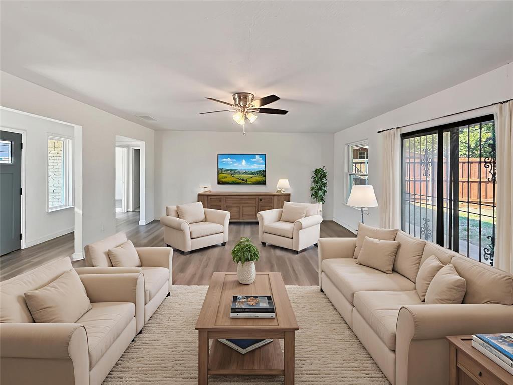 3549 Rio Grande Circle Dallas, TX 75233 - Photo 4 of 23 a living room with furniture and a large window