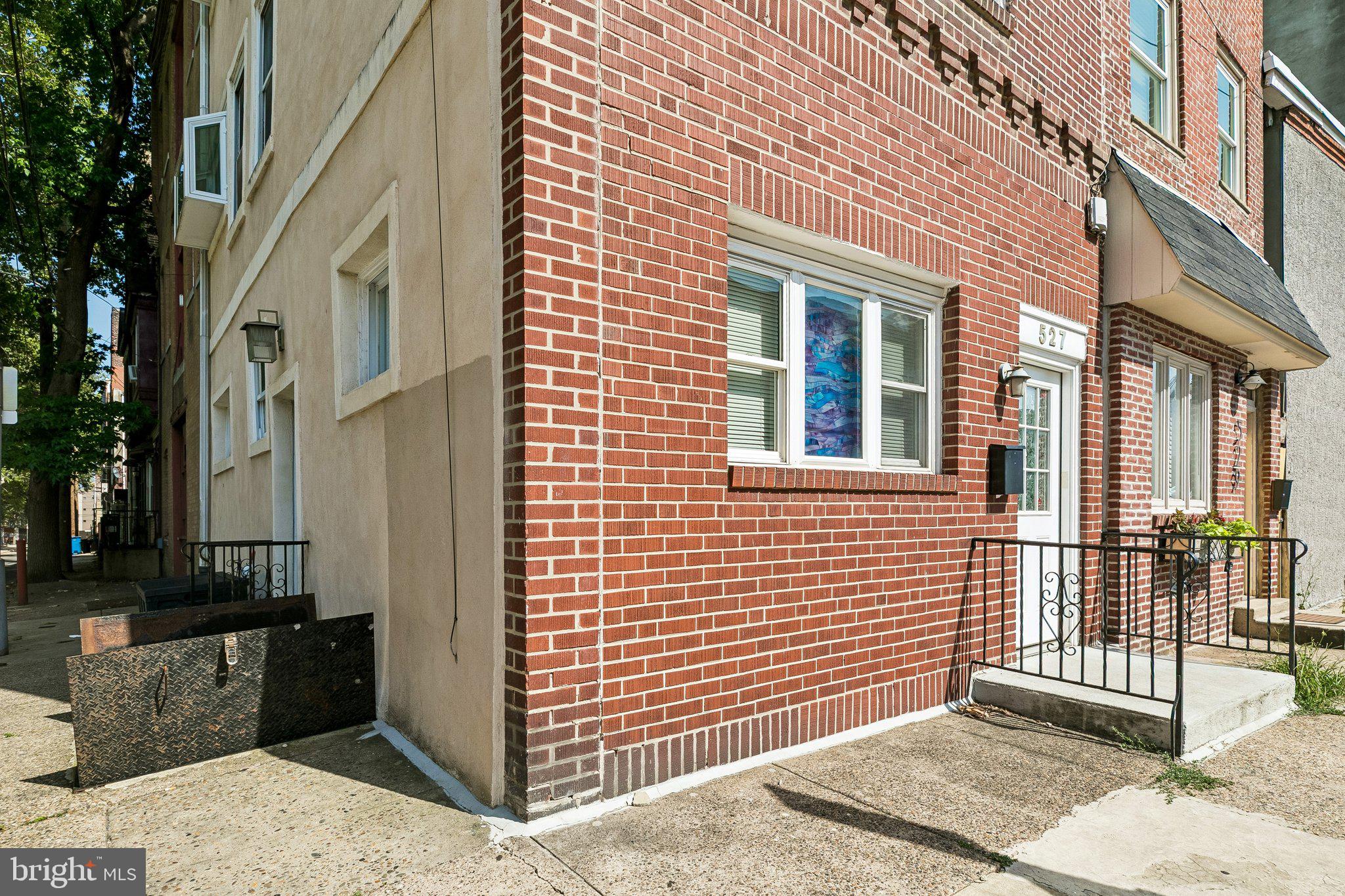 527 South 7th Street, Unit 1 Philadelphia, PA 19147 - Photo 3 of 33 Charming brick facade with inviting entry.