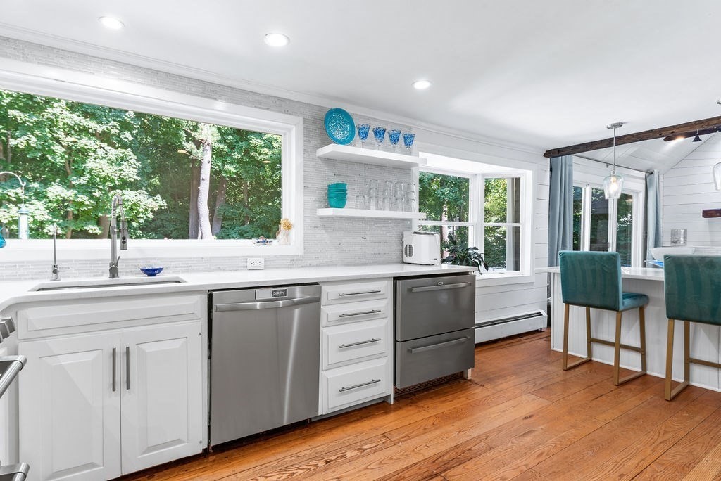 100 Circle Drive Wrentham, MA 02093 - Photo 12 of 42 a kitchen with a sink and cabinets