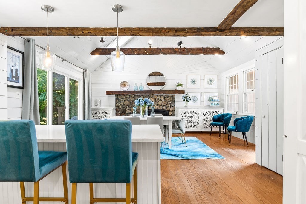 100 Circle Drive Wrentham, MA 02093 - Photo 13 of 42 a living room with furniture and a fireplace