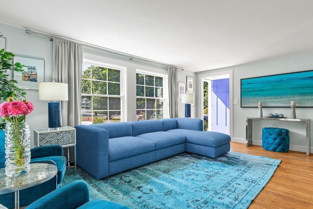 100 Circle Drive Wrentham, MA 02093 - Photo 15 of 42 a living room with furniture windows and a fireplace
