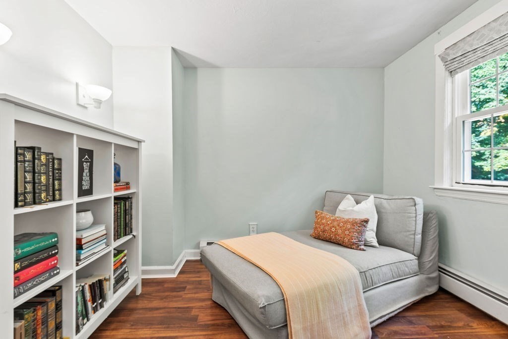 100 Circle Drive Wrentham, MA 02093 - Photo 29 of 42 a bed room with a bed and a book shelf