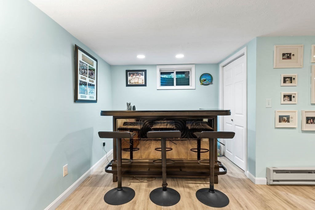 100 Circle Drive Wrentham, MA 02093 - Photo 32 of 42 a living room with furniture and a table