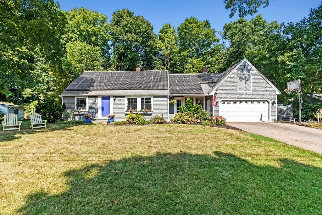 100 Circle Drive Wrentham, MA 02093 - Photo 42 of 42 a front view of a house with a yard and trees