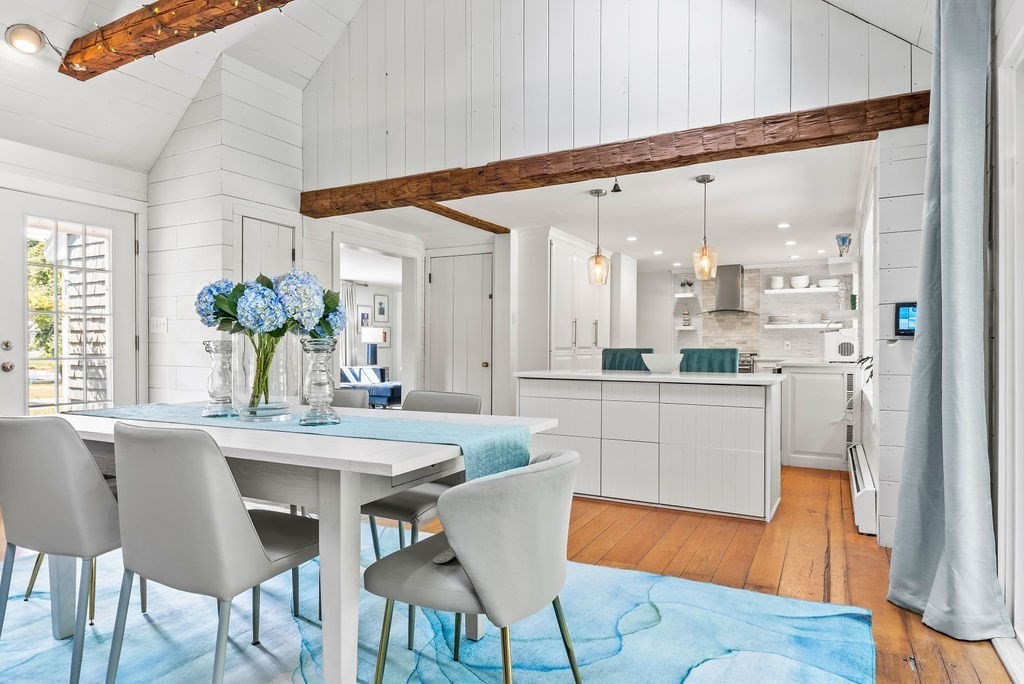 100 Circle Drive Wrentham, MA 02093 - Photo 7 of 42 a kitchen with a table and chairs