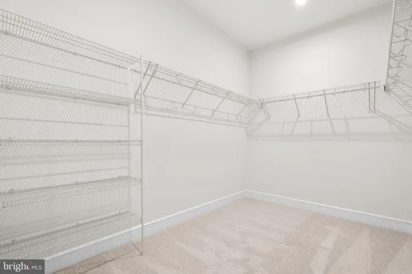 a view of a room with racks on the wall