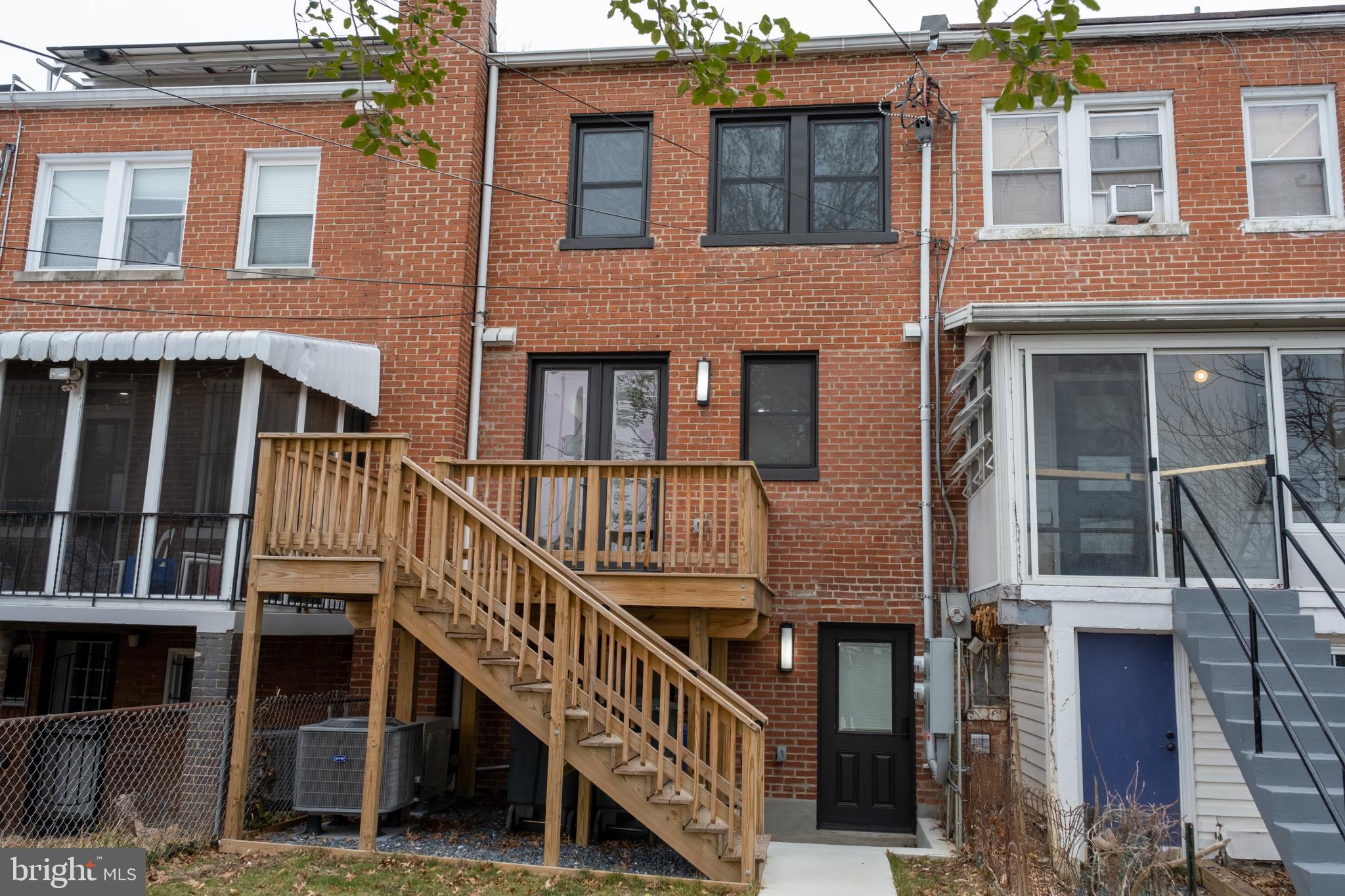 216 Jefferson Street Northwest, Unit A Washington, DC 20011 - Photo 29 of 32 a view of a brick building with many windows