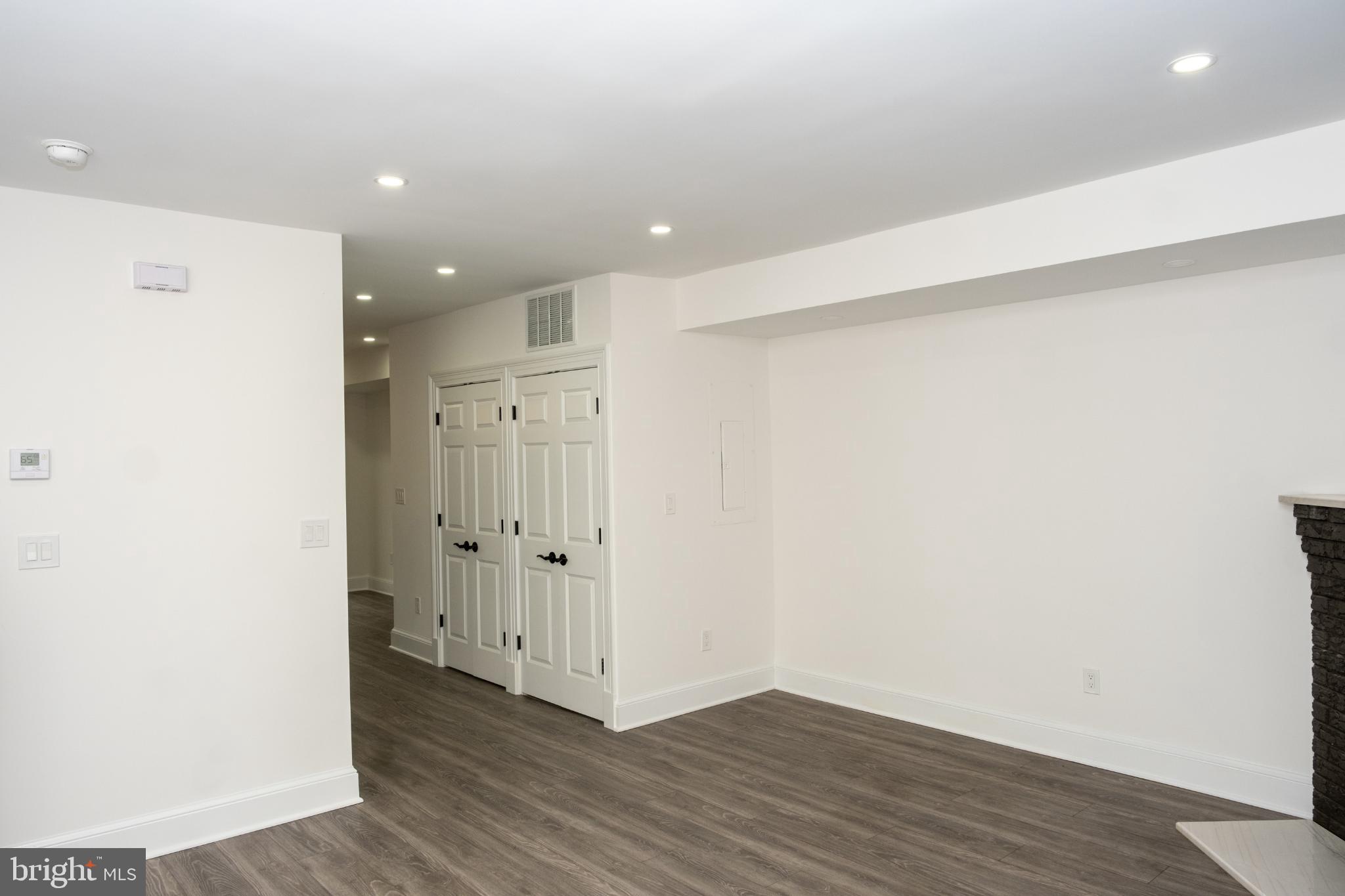 216 Jefferson Street Northwest, Unit A Washington, DC 20011 - Photo 5 of 32 a view of a hallway with wooden floor