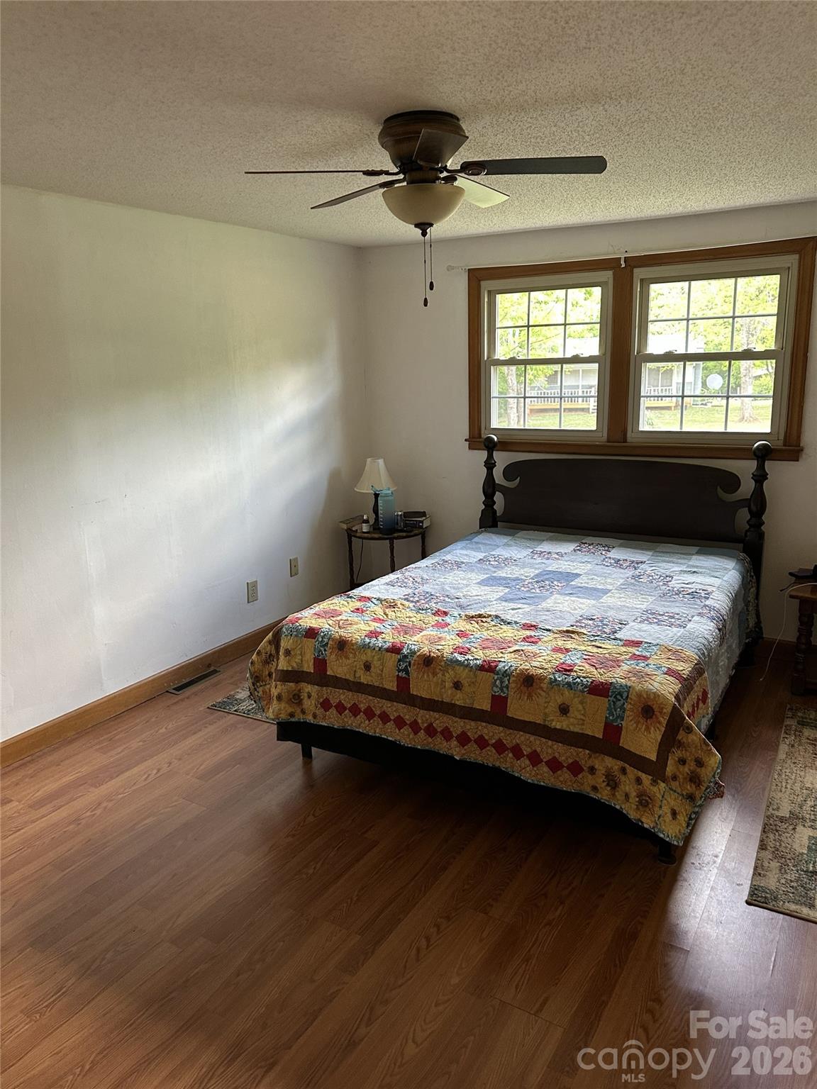 495 Grays Creek Church Road Rutherfordton, NC 28139 - Photo 12 of 12 a bedroom with a bed and a window