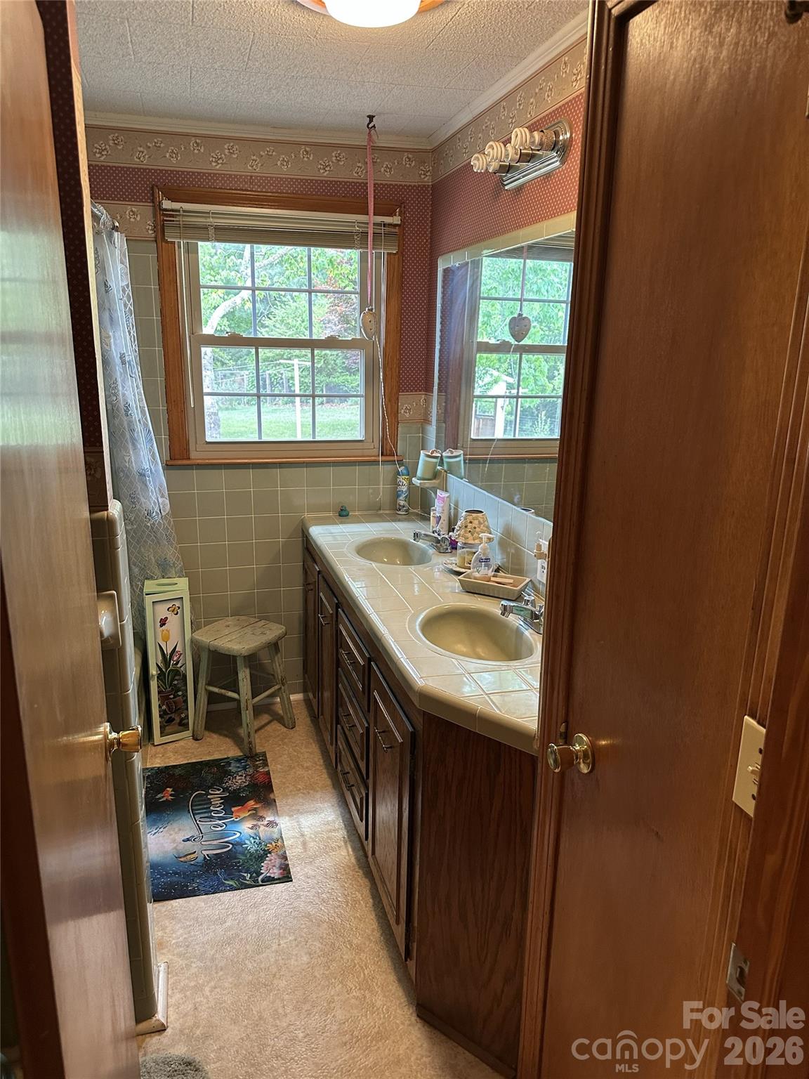 495 Grays Creek Church Road Rutherfordton, NC 28139 - Photo 6 of 12 a bathroom with a sink and a mirror