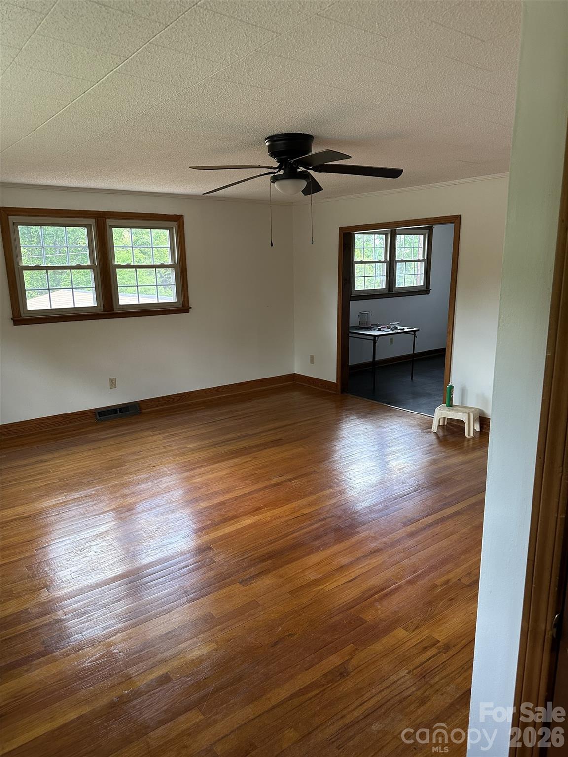 495 Grays Creek Church Road Rutherfordton, NC 28139 - Photo 9 of 12 wooden floor in an empty room with a window