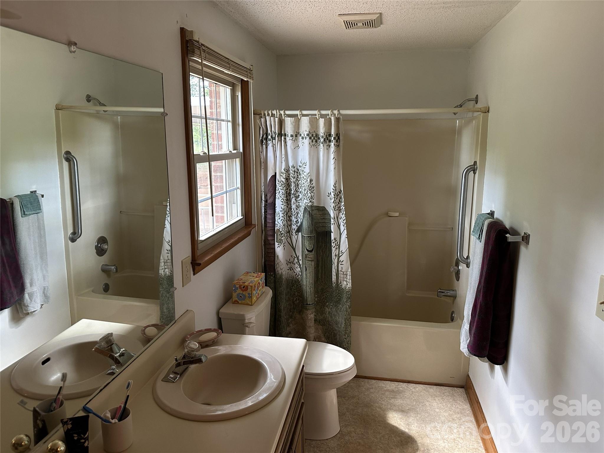 495 Grays Creek Church Road Rutherfordton, NC 28139 - Photo 10 of 12 a bathroom with a sink toilet and shower