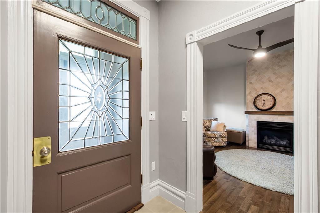 1520 4th Avenue Coraopolis, PA 15108 - Photo 4 of 37 Front entry through double doors into classic vestibule featuring stunning antique door with leaded glass and transom window