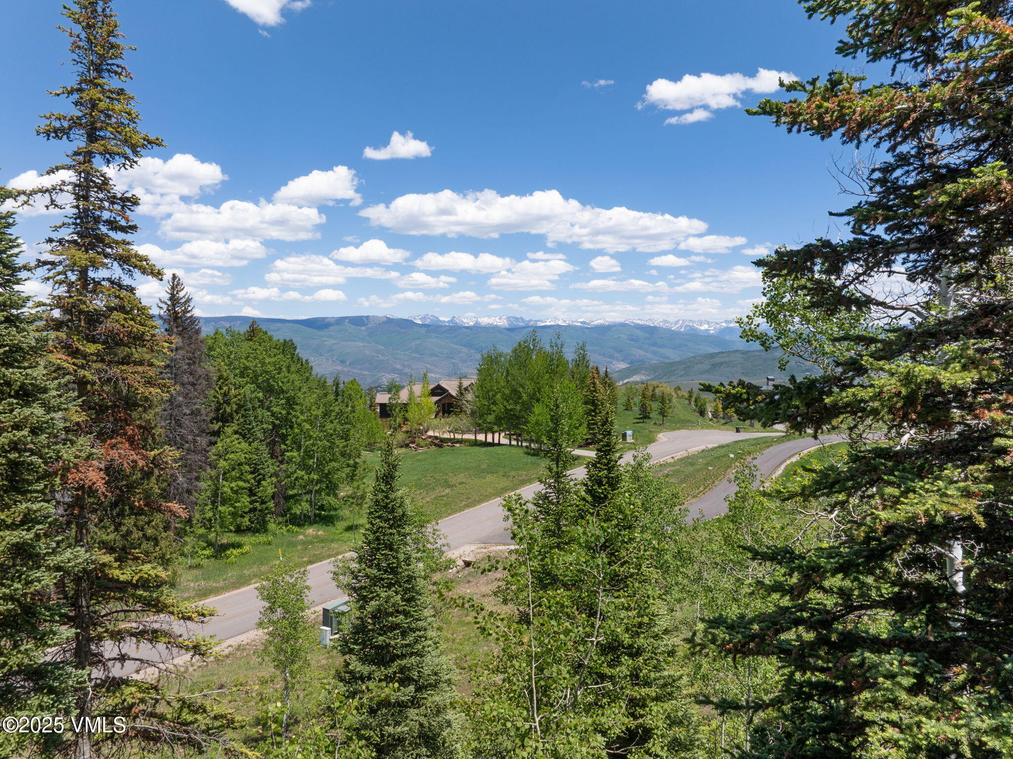 782 Granite Springs Trail Edwards, CO 81632 - Photo 4 of 33 a view of a lake with a yard