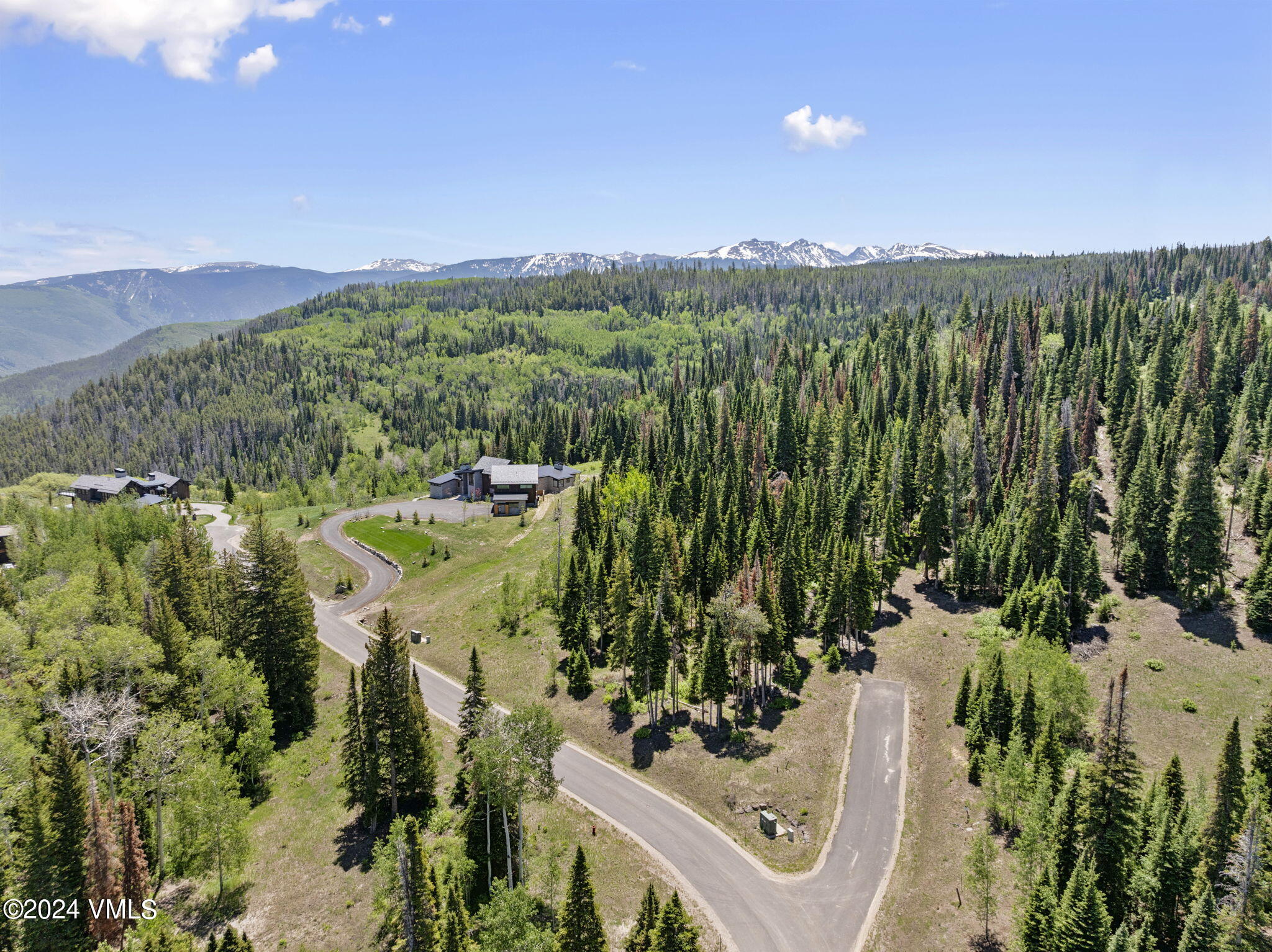 782 Granite Springs Trail Edwards, CO 81632 - Photo 5 of 33 a view of a city with lush green forest