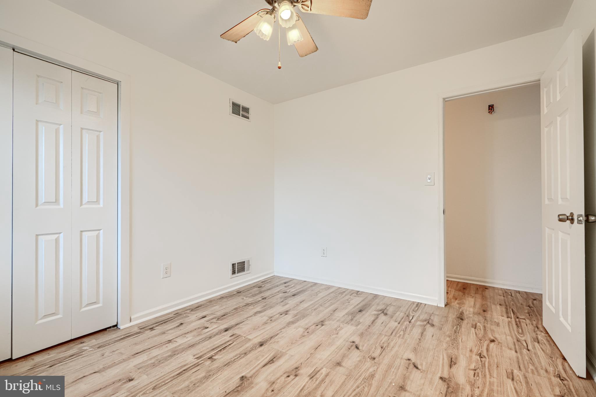 1167 Long Valley Road Westminster, MD 21158 - Photo 15 of 36 a view of empty room with wooden floor