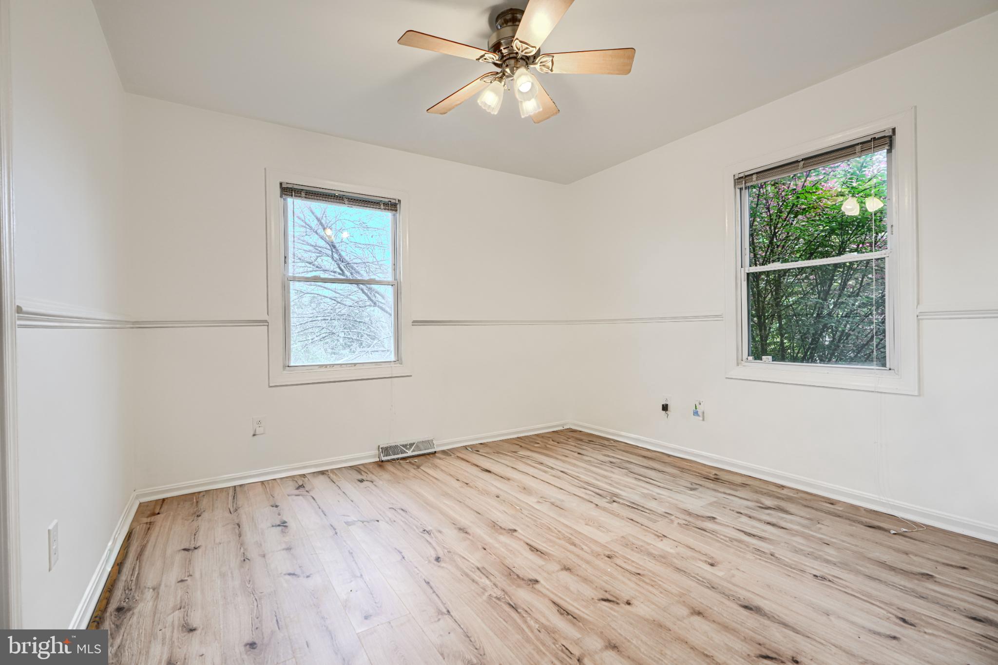 1167 Long Valley Road Westminster, MD 21158 - Photo 16 of 36 wooden floor in an empty room with a window