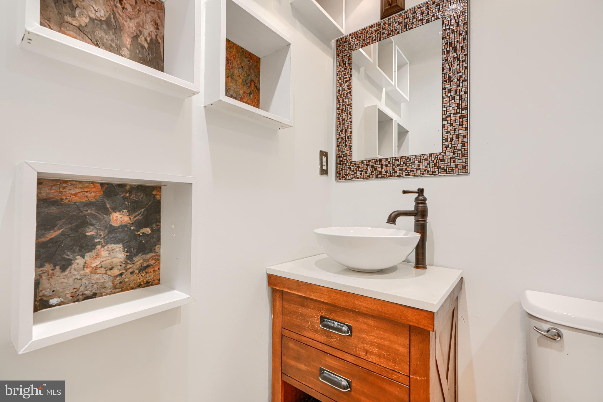 1167 Long Valley Road Westminster, MD 21158 - Photo 19 of 36 a bathroom with a mirror and a sink