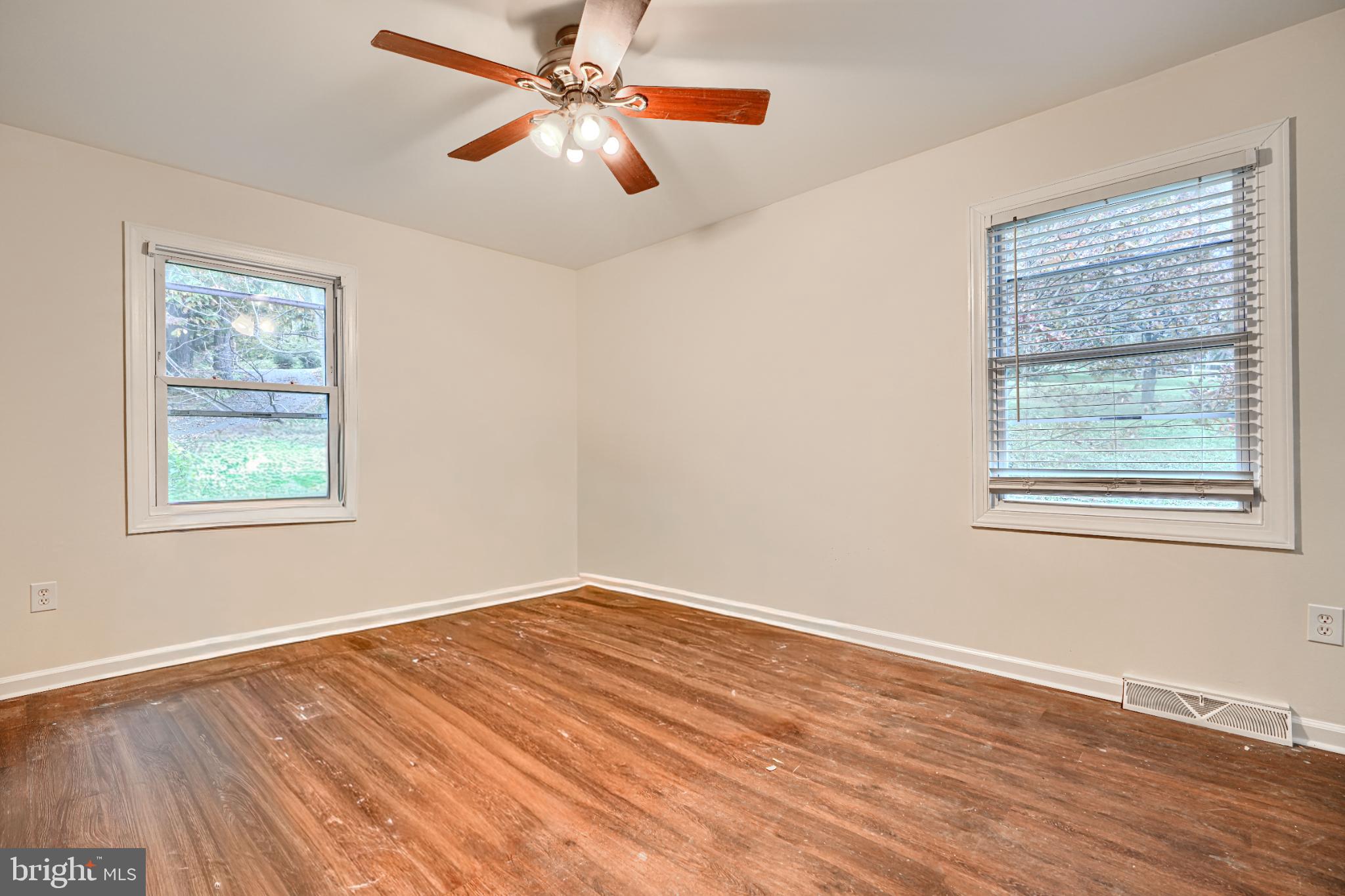 1167 Long Valley Road Westminster, MD 21158 - Photo 21 of 36 a view of empty room with wooden floor and fan