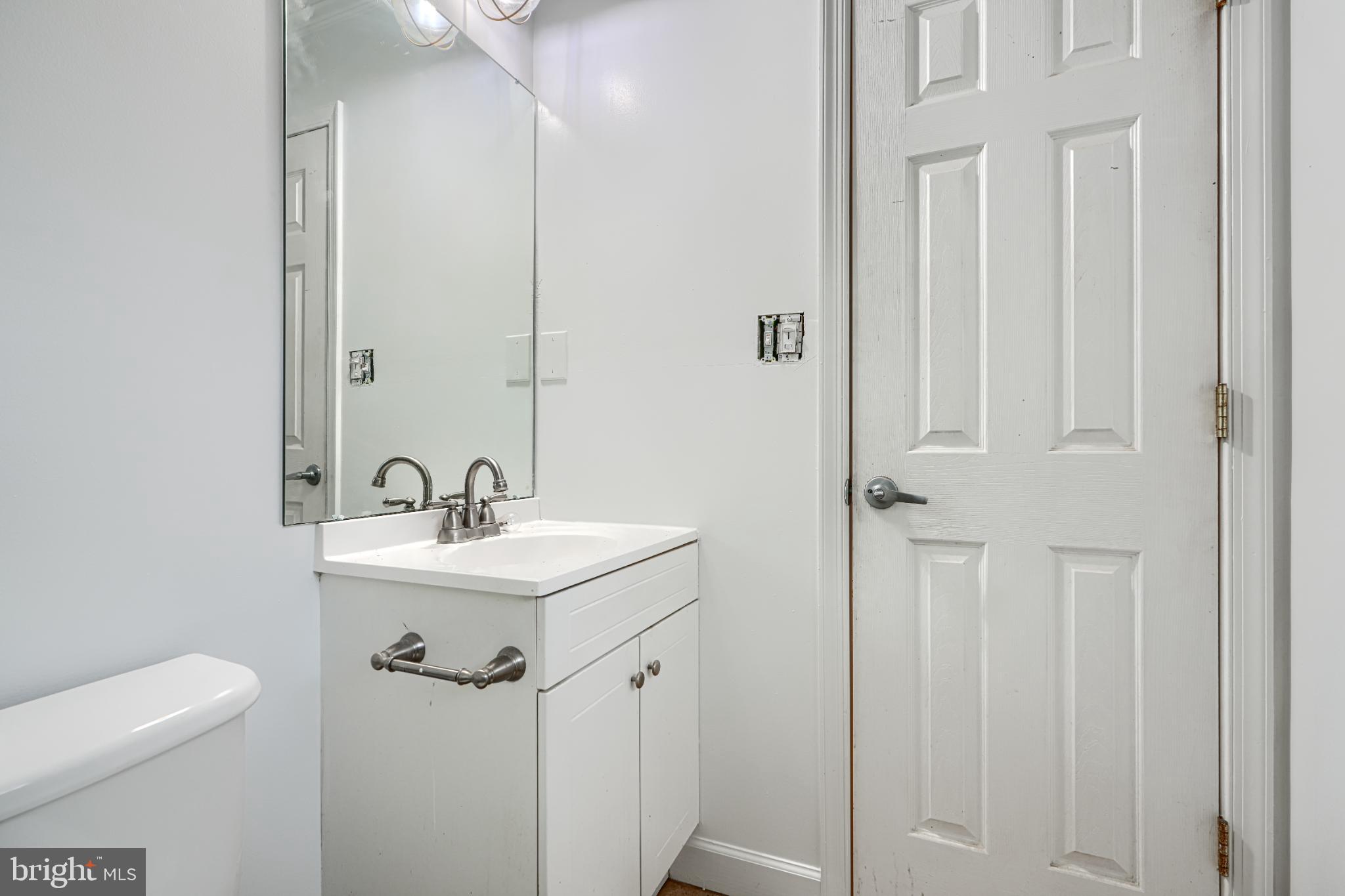 1167 Long Valley Road Westminster, MD 21158 - Photo 23 of 36 a bathroom with a sink a toilet and shower