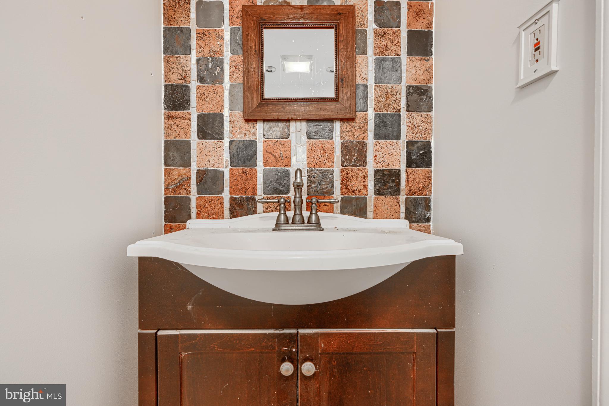 1167 Long Valley Road Westminster, MD 21158 - Photo 31 of 36 a bathroom with a sink and a mirror