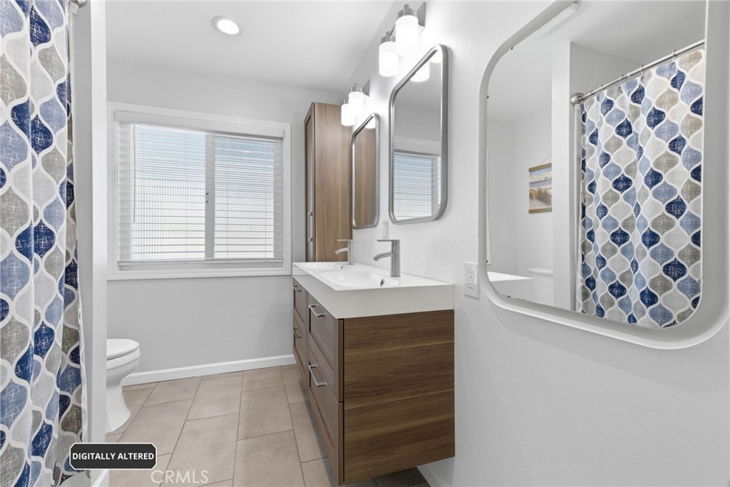 1935 West Chanticleer Road Anaheim, CA 92804 - Photo 21 of 33 Remodeled Hall Bath