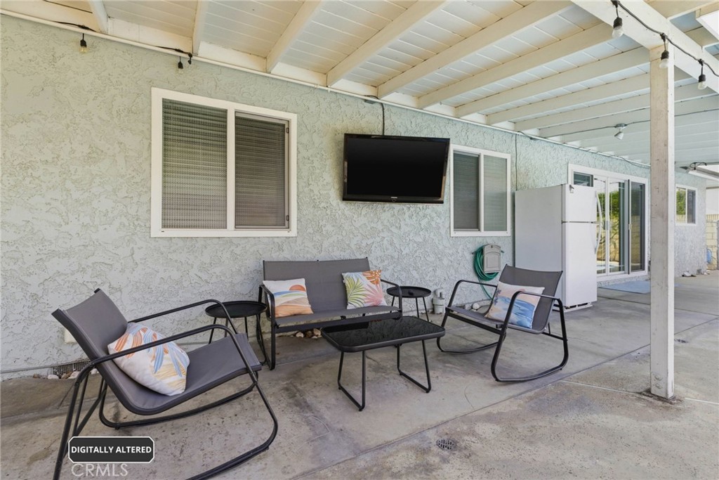 1935 West Chanticleer Road Anaheim, CA 92804 - Photo 26 of 33 Relaxing Covered Patio w/TV