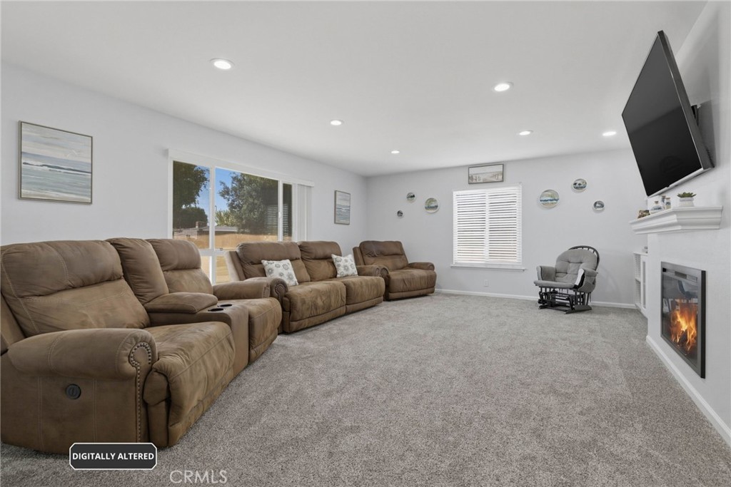 1935 West Chanticleer Road Anaheim, CA 92804 - Photo 4 of 33 Spacious and Light filled Living Room with Fireplace, Recessed Lighting & Built-Ins