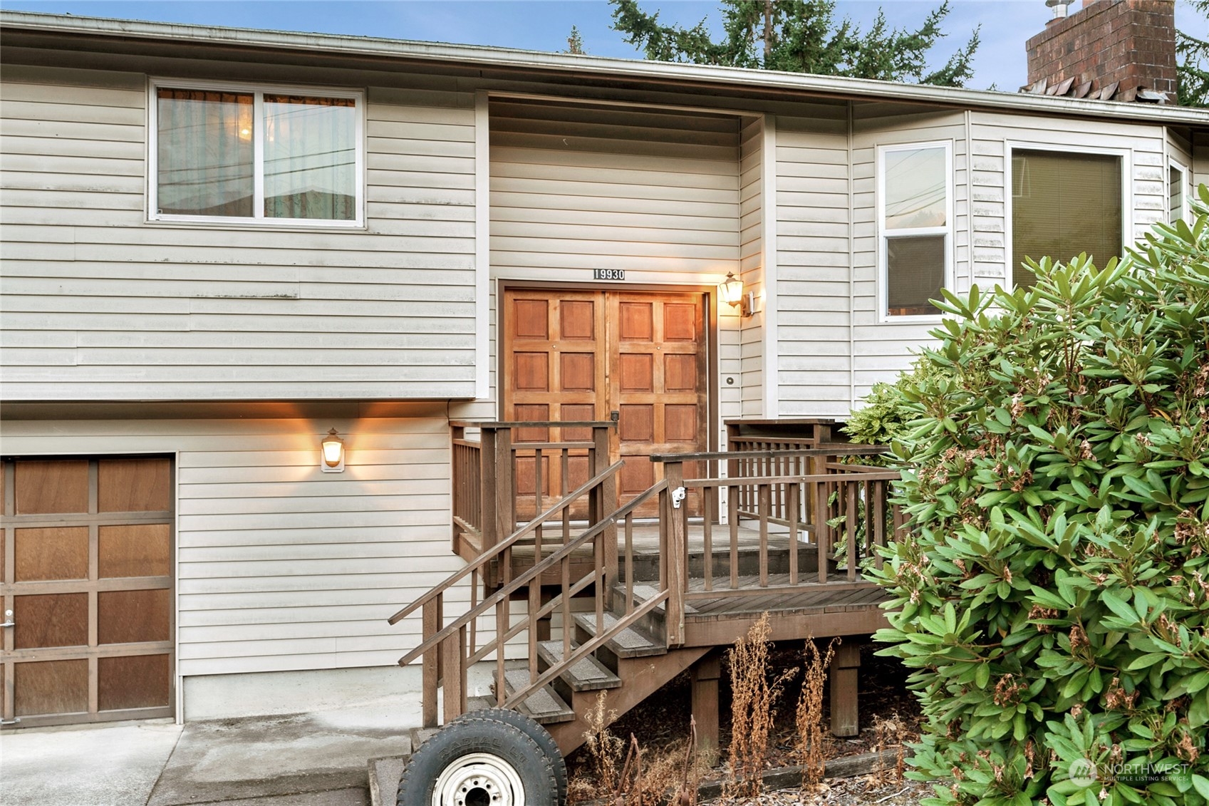19930 13th Drive Southeast Bothell, WA 98012 - Photo 3 of 22 a view of a house with a deck