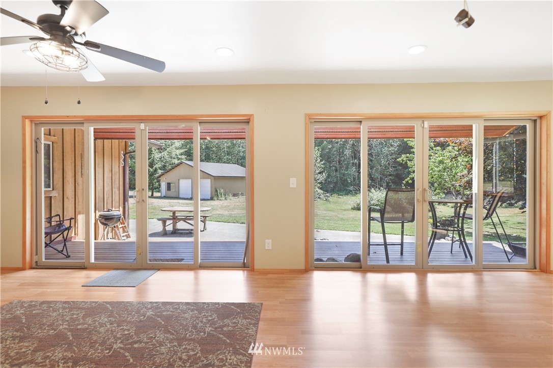 50332 Concrete Sauk Valley Road Concrete, WA 98237 - Photo 15 of 40 a view of livingroom with furniture wooden floor and windows