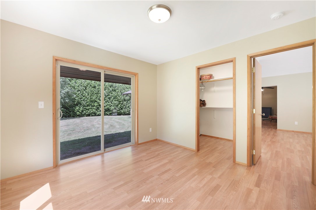 50332 Concrete Sauk Valley Road Concrete, WA 98237 - Photo 19 of 40 wooden floor in an empty room with a window