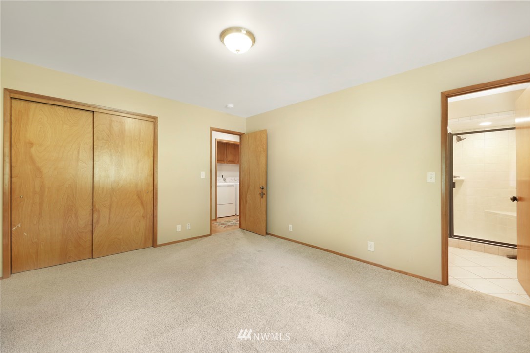 50332 Concrete Sauk Valley Road Concrete, WA 98237 - Photo 24 of 40 an empty room with sliding door and a bathroom