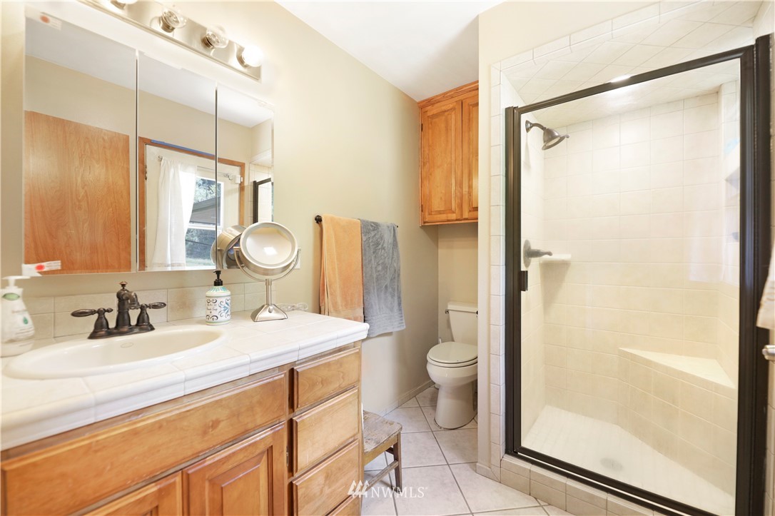50332 Concrete Sauk Valley Road Concrete, WA 98237 - Photo 25 of 40 a bathroom with a sink toilet and shower