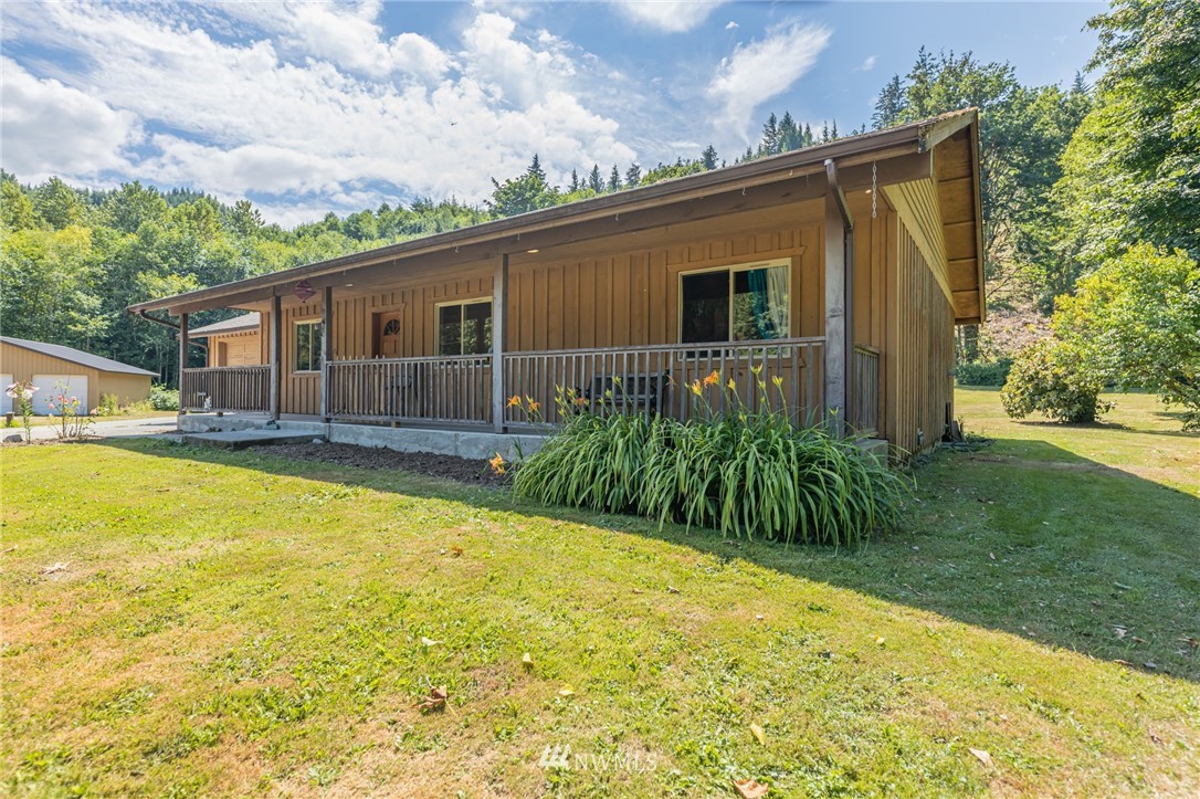 50332 Concrete Sauk Valley Road Concrete, WA 98237 - Photo 3 of 40 a view of a house with pool and a yard