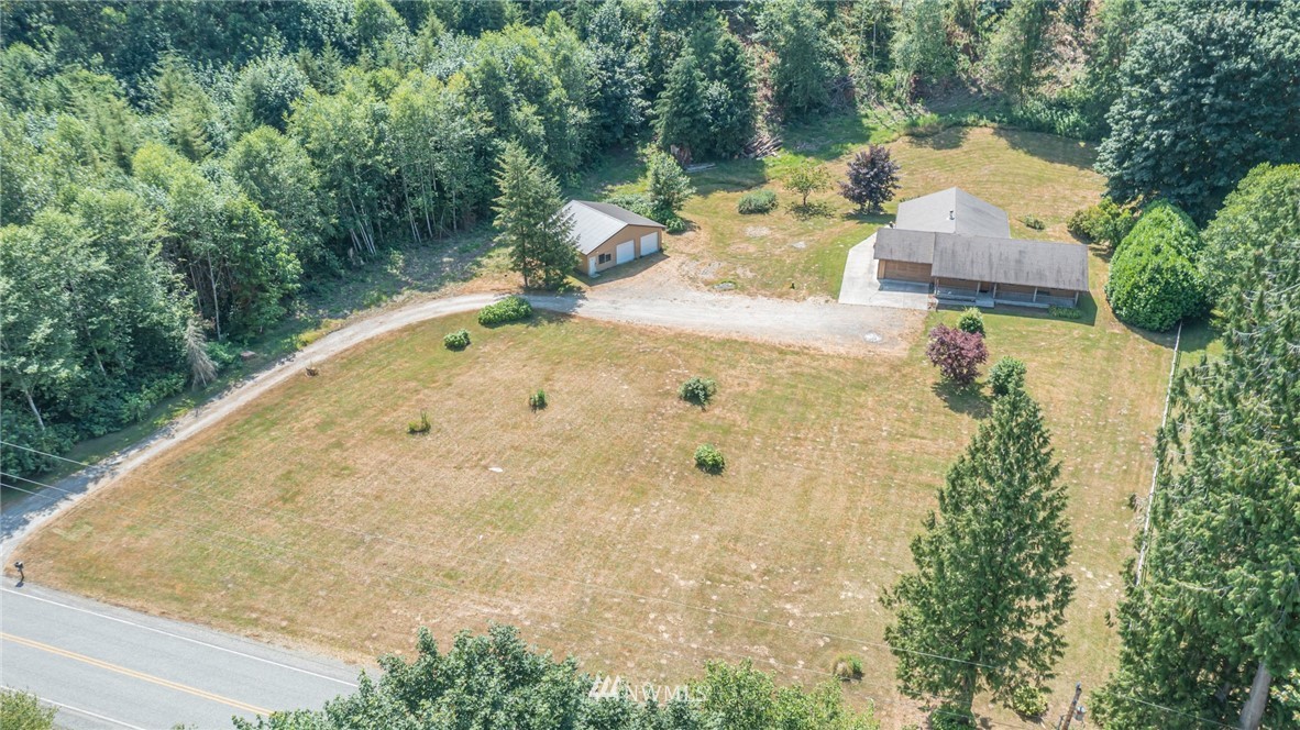 50332 Concrete Sauk Valley Road Concrete, WA 98237 - Photo 32 of 40 a view of a swimming pool with a yard