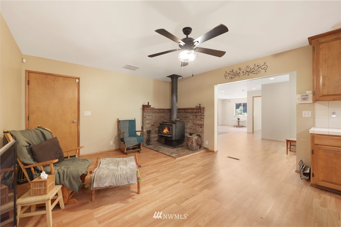50332 Concrete Sauk Valley Road Concrete, WA 98237 - Photo 7 of 40 a living room with furniture and a chandelier
