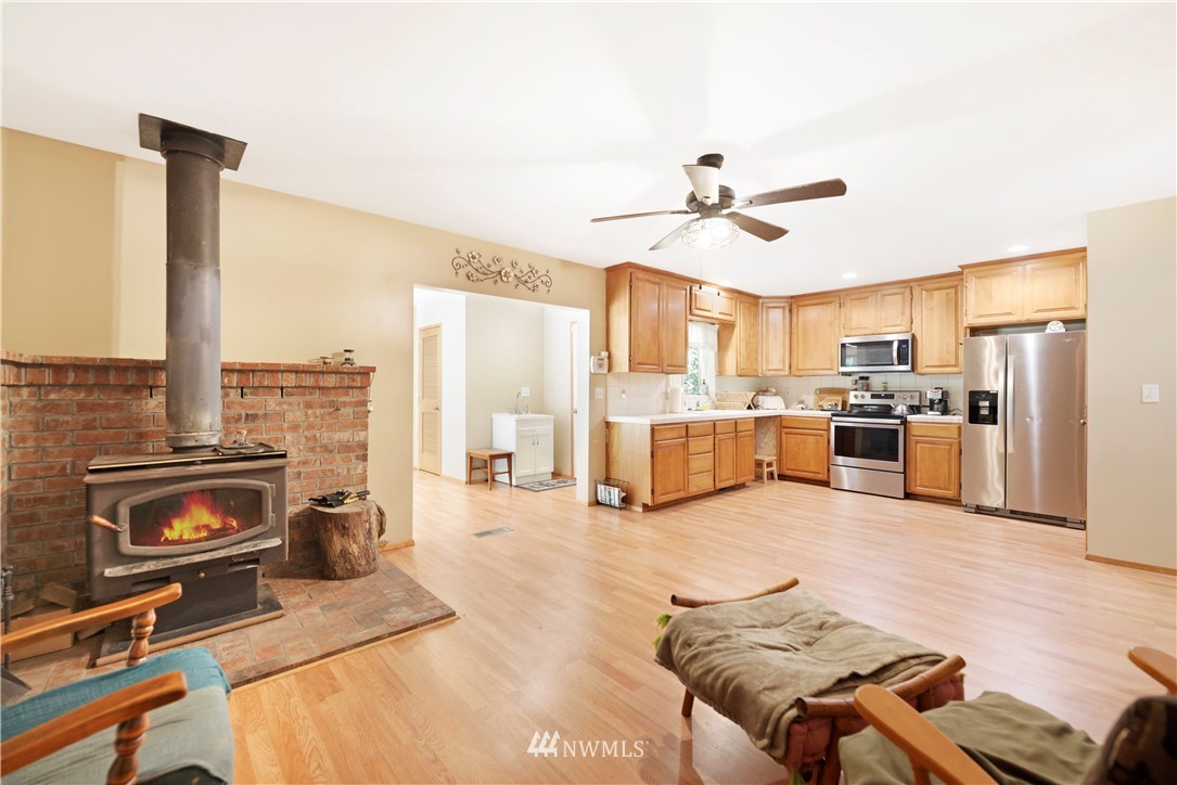 50332 Concrete Sauk Valley Road Concrete, WA 98237 - Photo 8 of 40 a living room with furniture and kitchen view