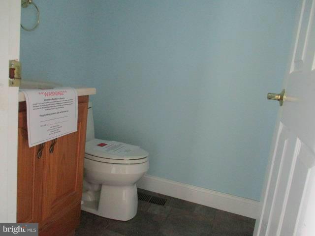 2919 Ritchie Avenue Baltimore, MD 21219 - Photo 11 of 24 a bathroom with a toilet and a sink