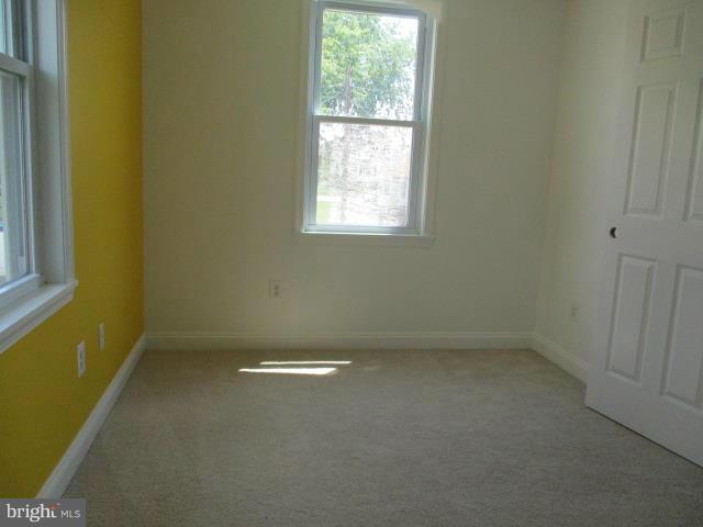 2919 Ritchie Avenue Baltimore, MD 21219 - Photo 14 of 24 an empty room with a window