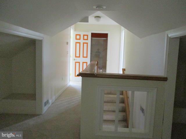 2919 Ritchie Avenue Baltimore, MD 21219 - Photo 17 of 24 a view of a hallway with windows