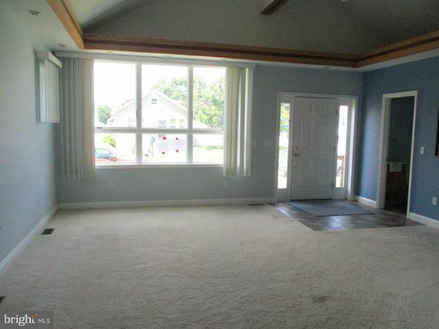 2919 Ritchie Avenue Baltimore, MD 21219 - Photo 4 of 24 a view of an empty room with a window