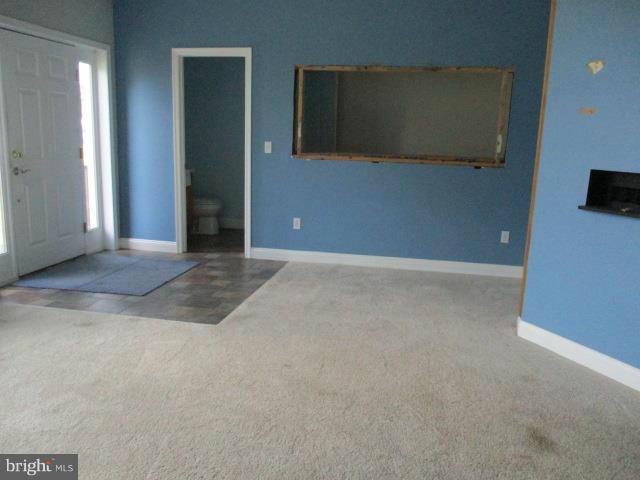 2919 Ritchie Avenue Baltimore, MD 21219 - Photo 6 of 24 a view of an empty room with windows