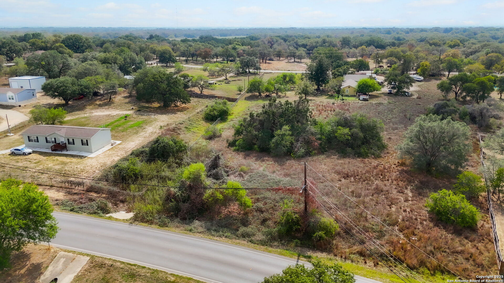3810 New Mathis Road Elmendorf, TX 78112 - Photo 7 of 15 an aerial view of residential house with outdoor space