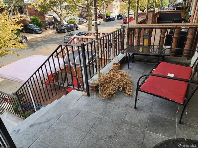 a view of a chairs setting on the roof deck
