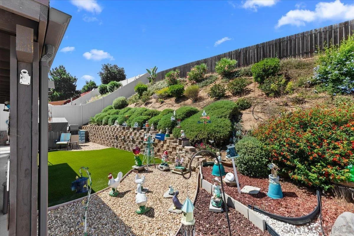 9254 Shadow Hill Road Santee, CA 92071 - Photo 33 of 34 a view of a backyard with plants and patio