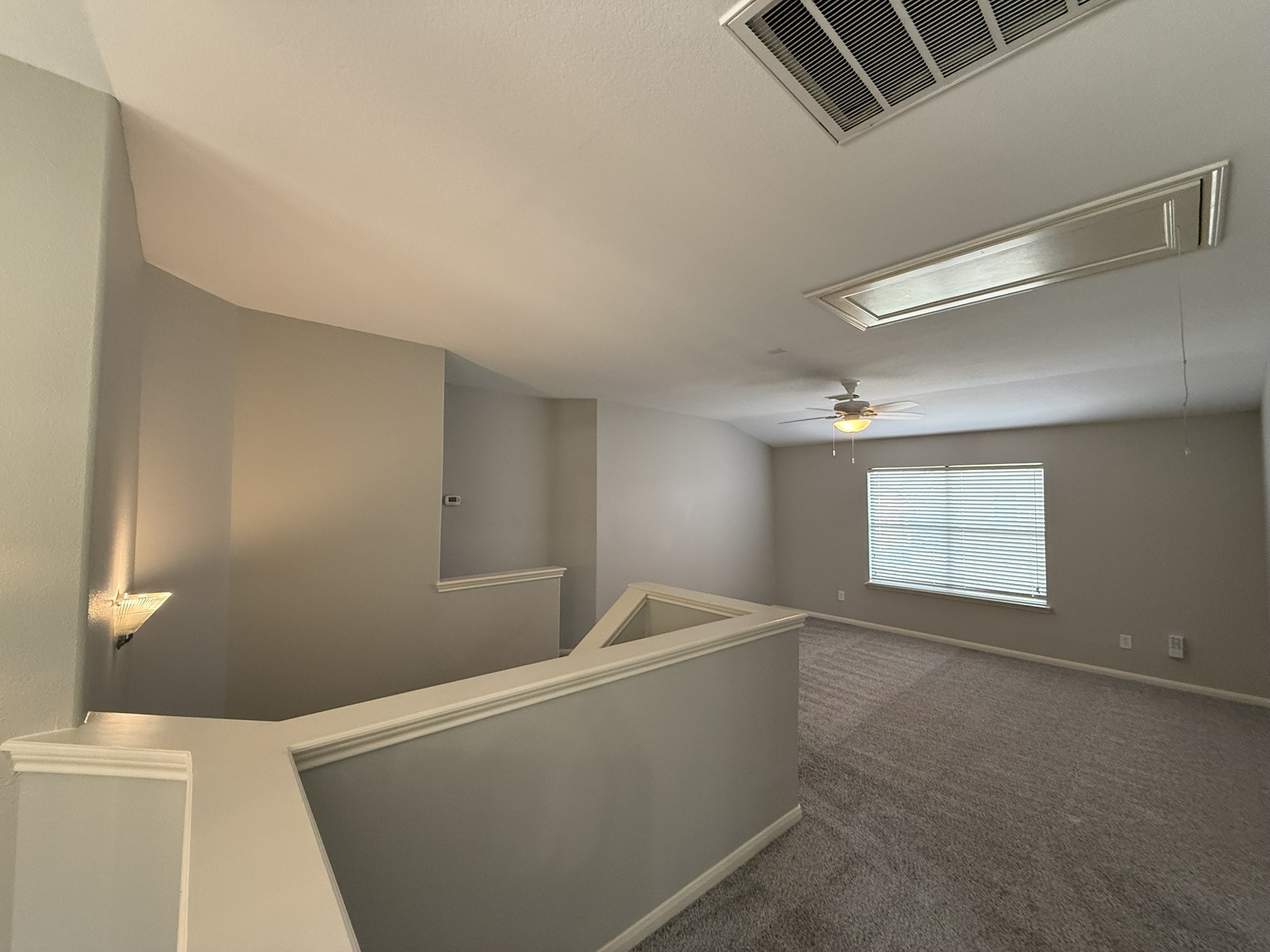 23610 Hidden Maple Drive Spring, TX 77373 - Photo 7 of 14 Top of stairs is open and overlooks the foyer.