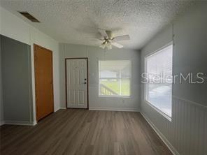 5416 Miley Road Plant City, FL 33565 - Photo 13 of 19 an empty room with windows and closet